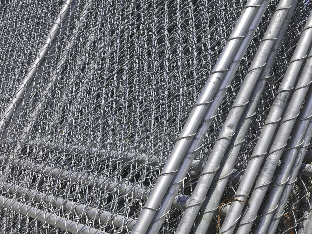 Barriers in abundance Stack of chain-link fencing on construction site